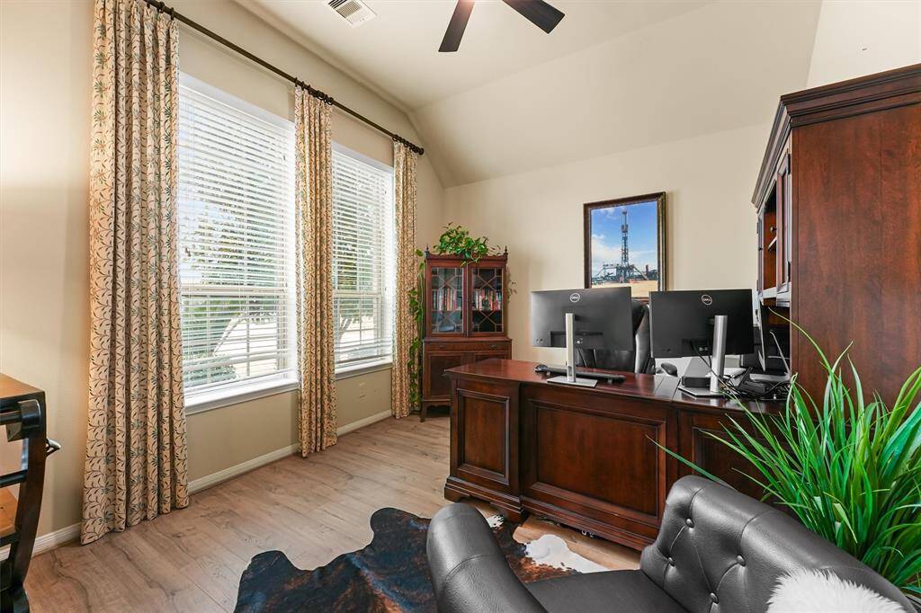This thoughtfully designed home office offers both function and style, making it the perfect place to focus and be productive.