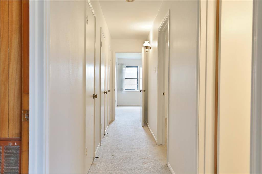 Your hallway with 3 closets!  Lots of storage!