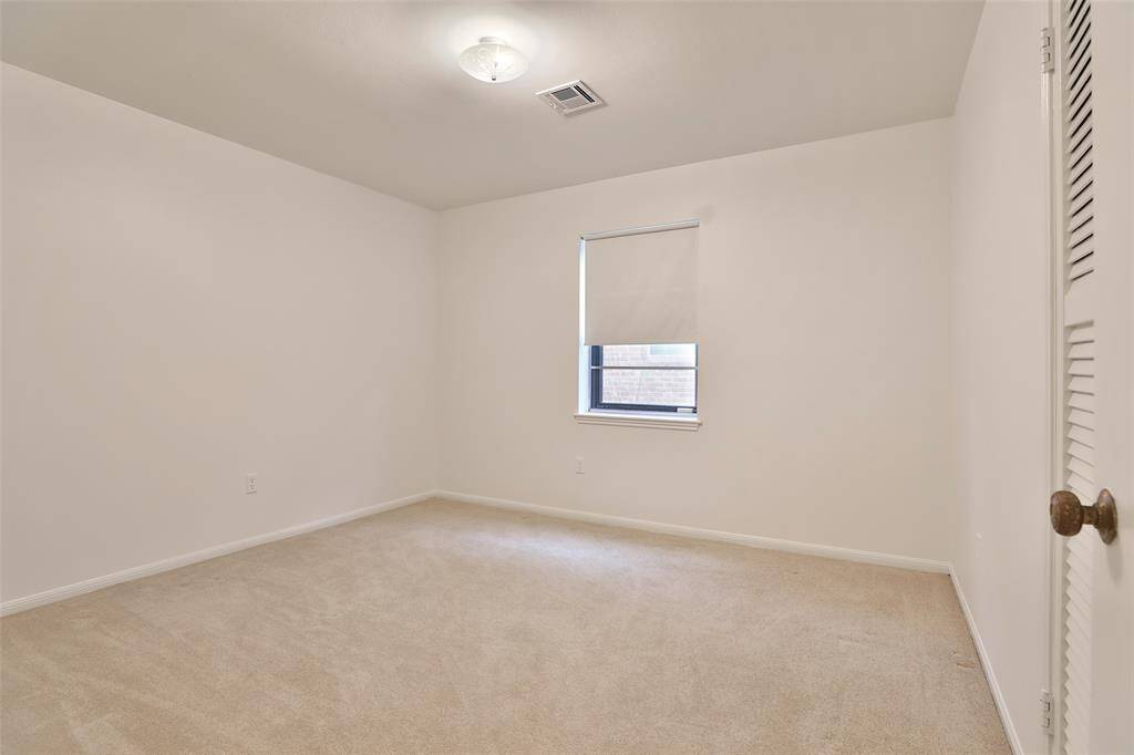 Middle bedroom may be smaller, but you could make this your office or computer room.