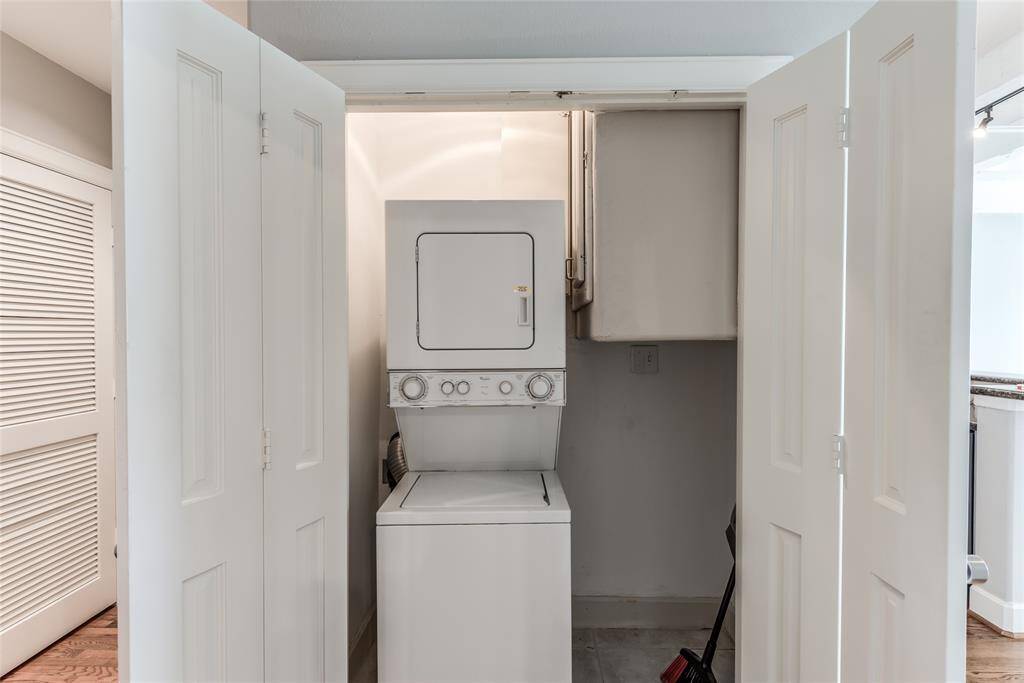 A closer look at the laundry space reveals additional room to the right, perfect for storage or organizing your laundry essentials.
