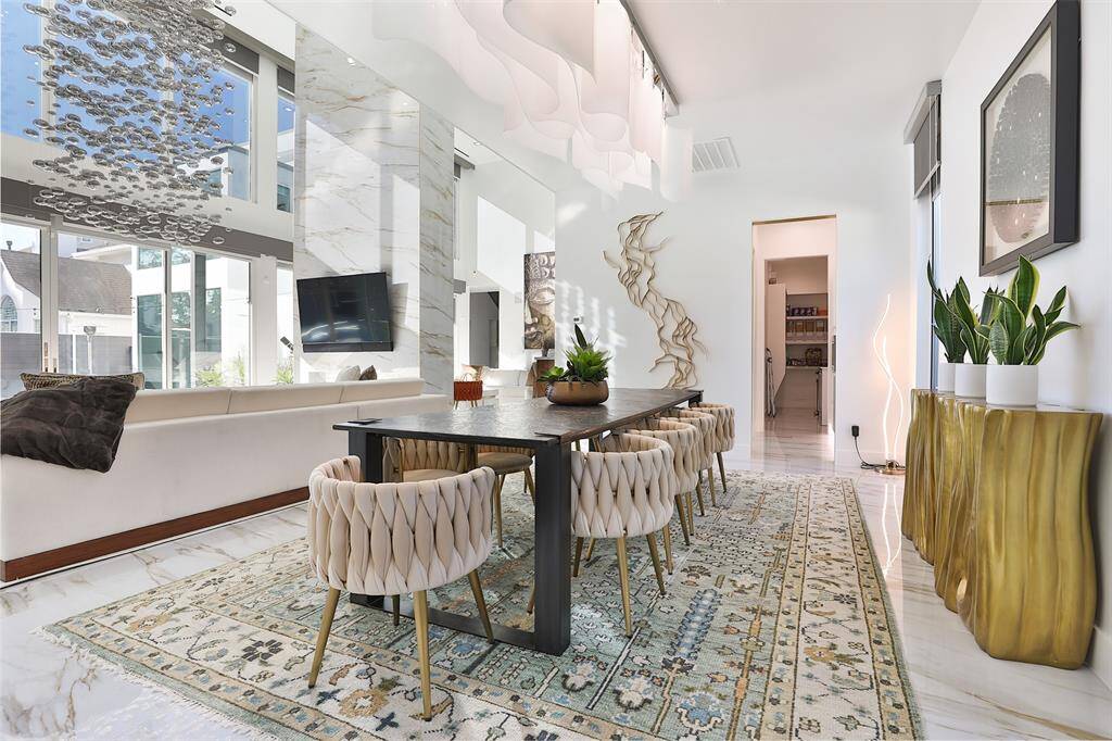 Dining room leads directly to the butler pantry making serving guests a breeze for dinner parties.