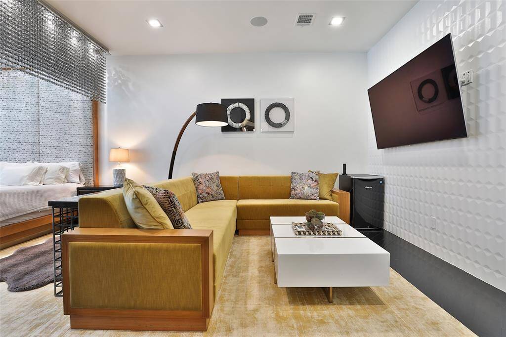 Note the whole house surround system operated by the Savant system.