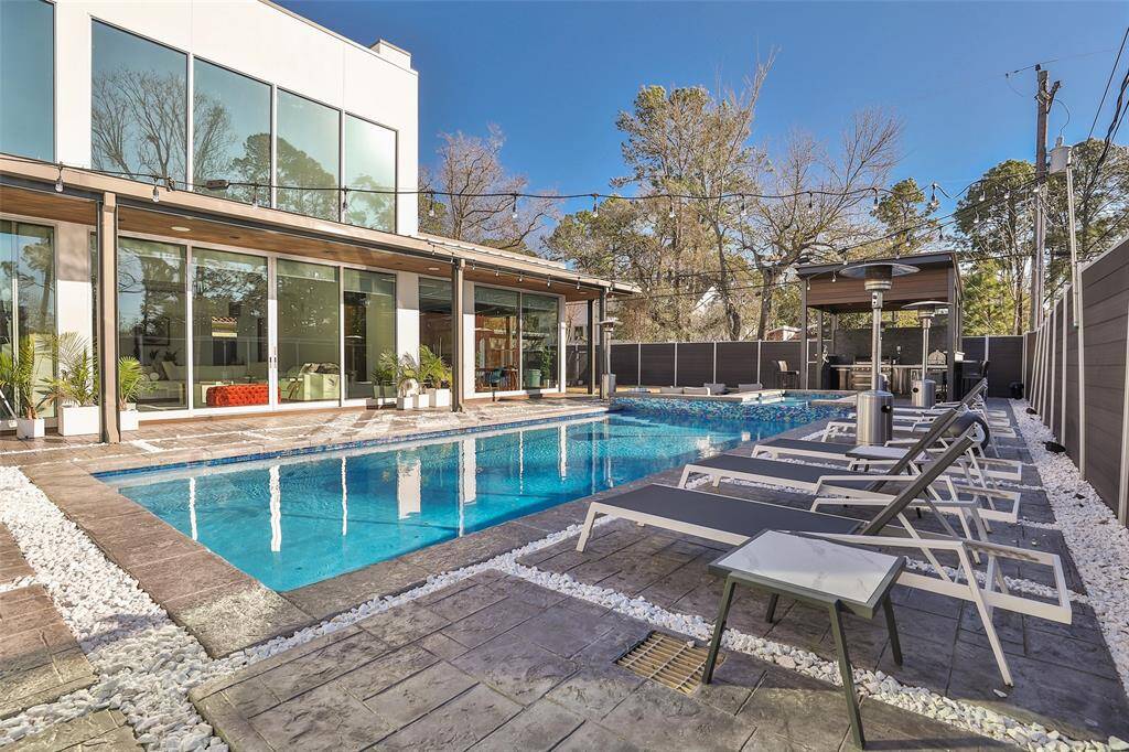 The majority of the home overlooks this masterpiece and was created with the intention of an outdoor lanai. French drains surround the stately pool decking tiles.