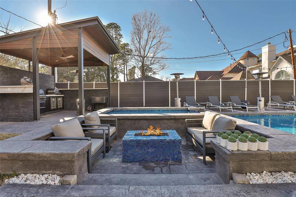 IPE decking material was utilized on the fencing, outdoor ceilings and the outdoor kitchen. IPEA doesn't rot, warp or mold in the Texas summer heat.