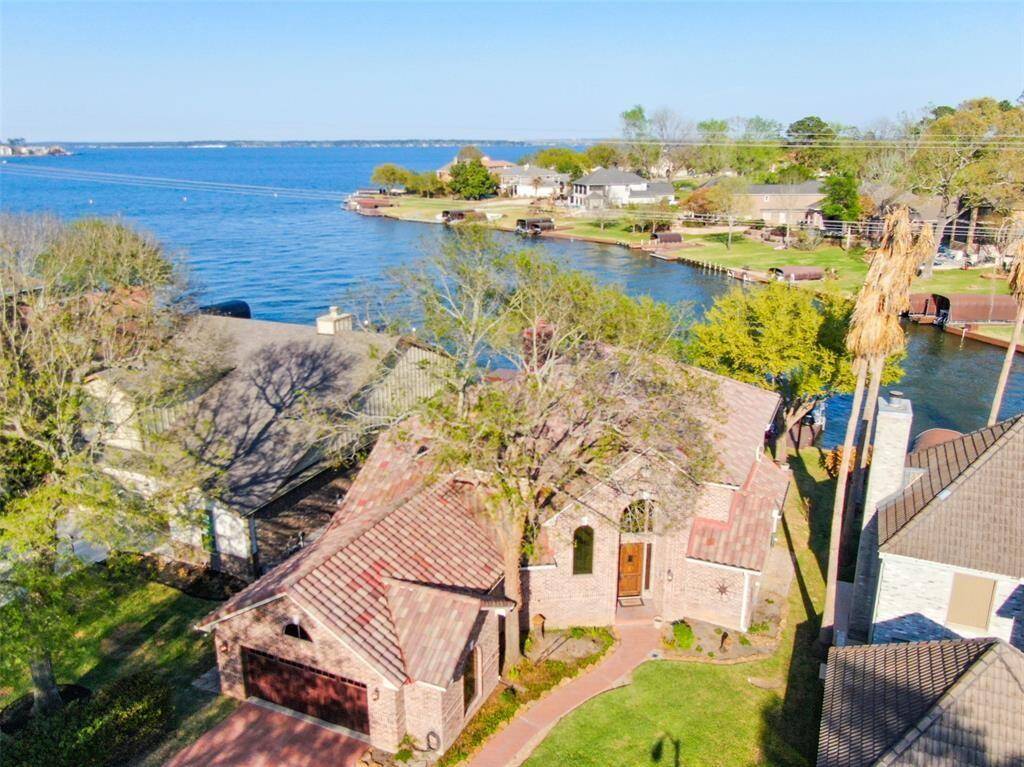 Discover your dream waterfront home with stunning lake views, nestled in a serene neighborhood. Perfect for relaxation and entertaining.
