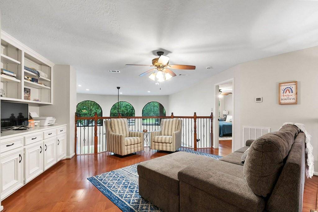 Inviting second-floor den/game room, perfect for relaxation and entertainment.