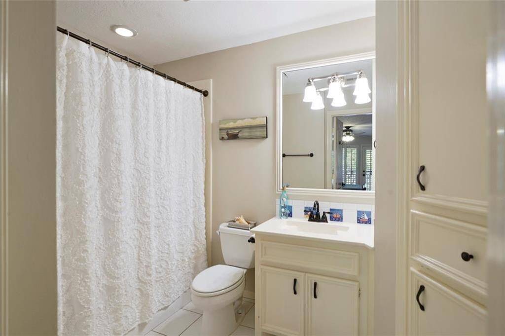 Spacious second-floor full bath with elegant fixtures.