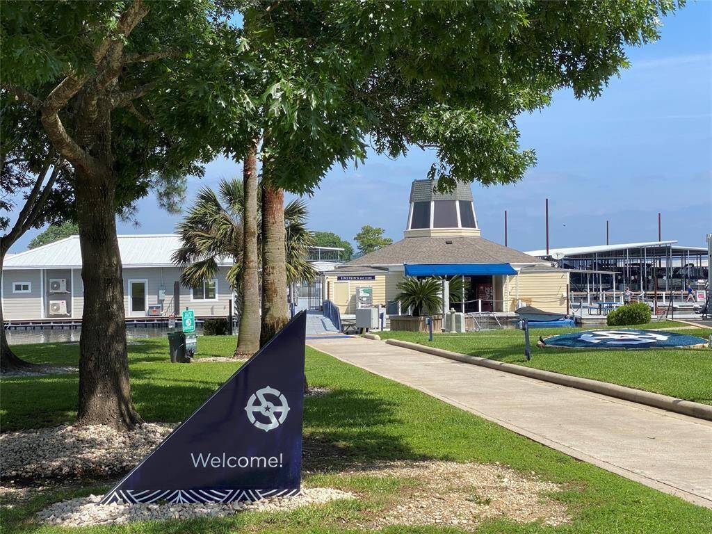 Welcome to your serene marina oasis, featuring lush greenery, inviting pathways, and modern amenities for a perfect waterfront lifestyle.