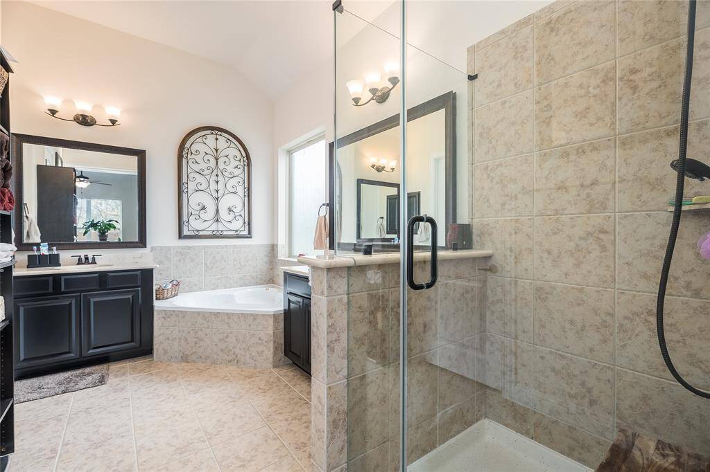 Separate shower and jetted tub in the master bath