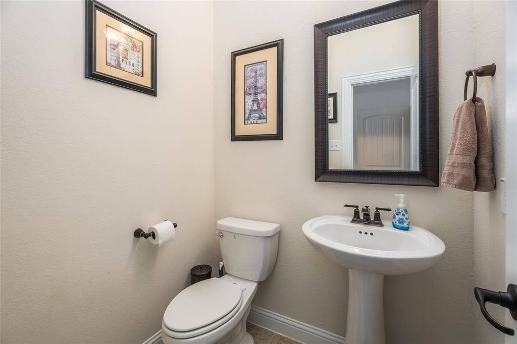 Half bath upstairs off of the gameroom