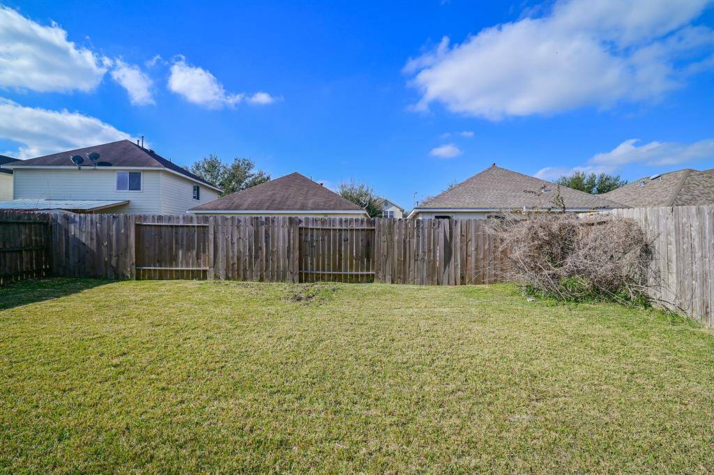Fully fenced backyard.