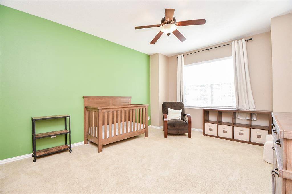 Spacious third bedroom on the second floor.