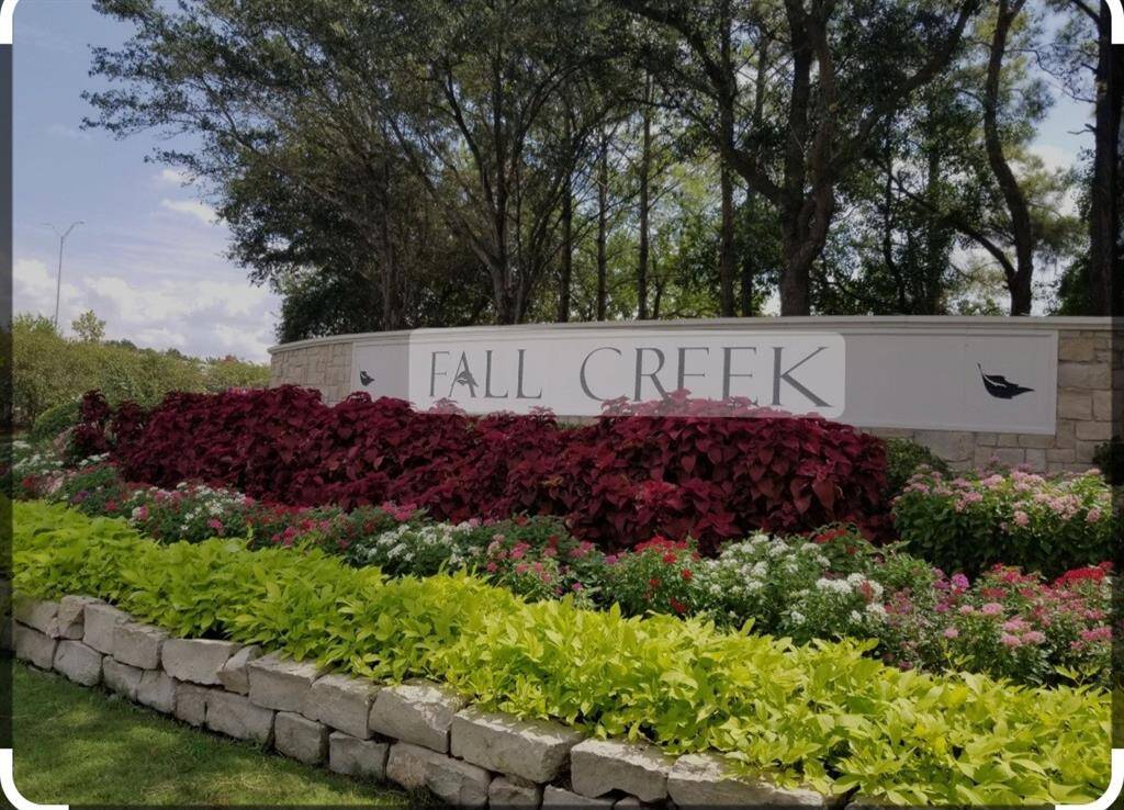 Welcome to Fall Creek Subdivision—a beautifully landscaped entrance awaits you.