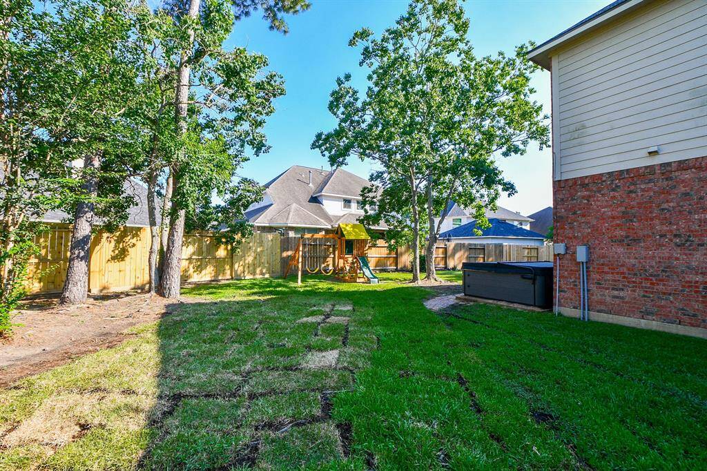 Expansive wrap-around backyard with ample space for a pool.