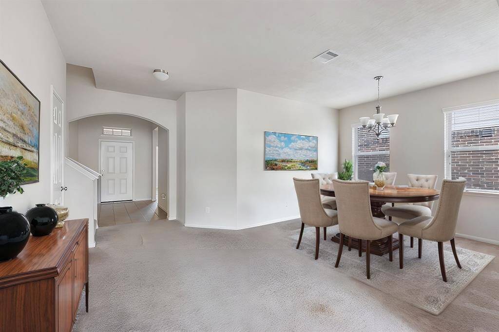 Photo is virtual stage to show space in the formal dinning room.