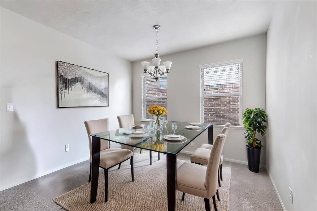 Photo is virtual stage to show space in the formal dinning room.