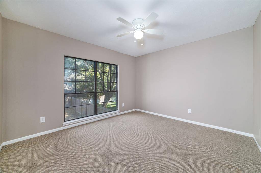 The secondary bedrooms enjoy natural light streaming in through large windows, views overlooking the yard, soothing décor tones, generous closet space, and energy efficient ceiling fans. All secondary bedrooms are approximately the same size.