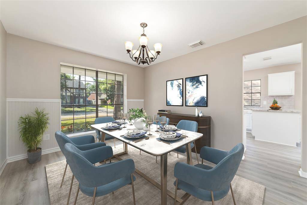 Whether hosting a dinner party with friends or savoring a meal with family, this spacious dining area brings people together. The dining room flows seamlessly into a well-appointed chef's kitchen. Virtually staged.