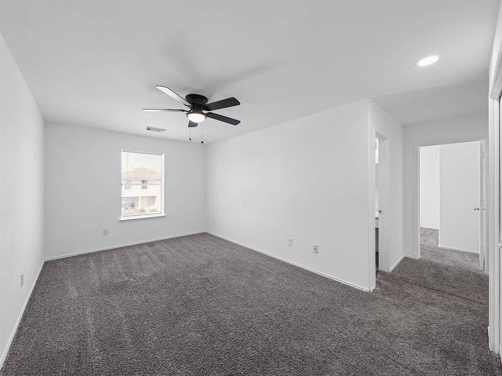 Alternative view of the game room showcasing the new ceiling fan that has been installed in multiple rooms of the home!