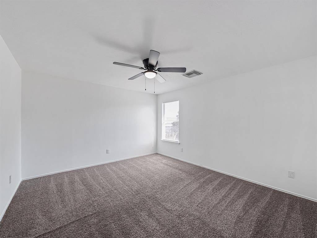 Alternative view of the primary bedroom.