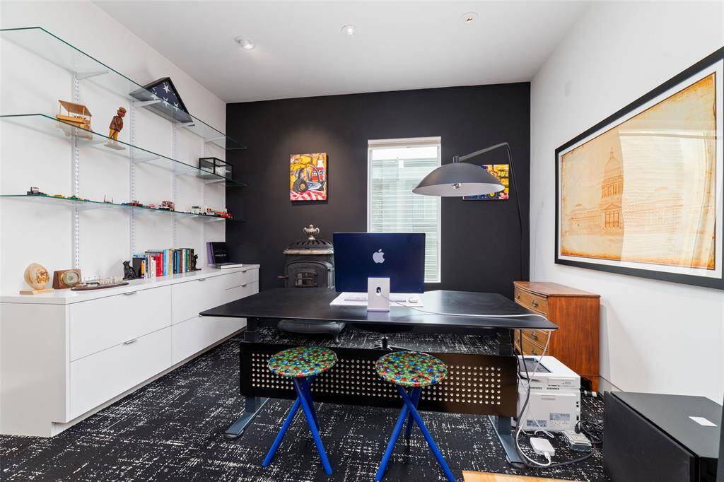 An additional flex space offers room for an office, a sitting area, or even a Baby Grand piano.