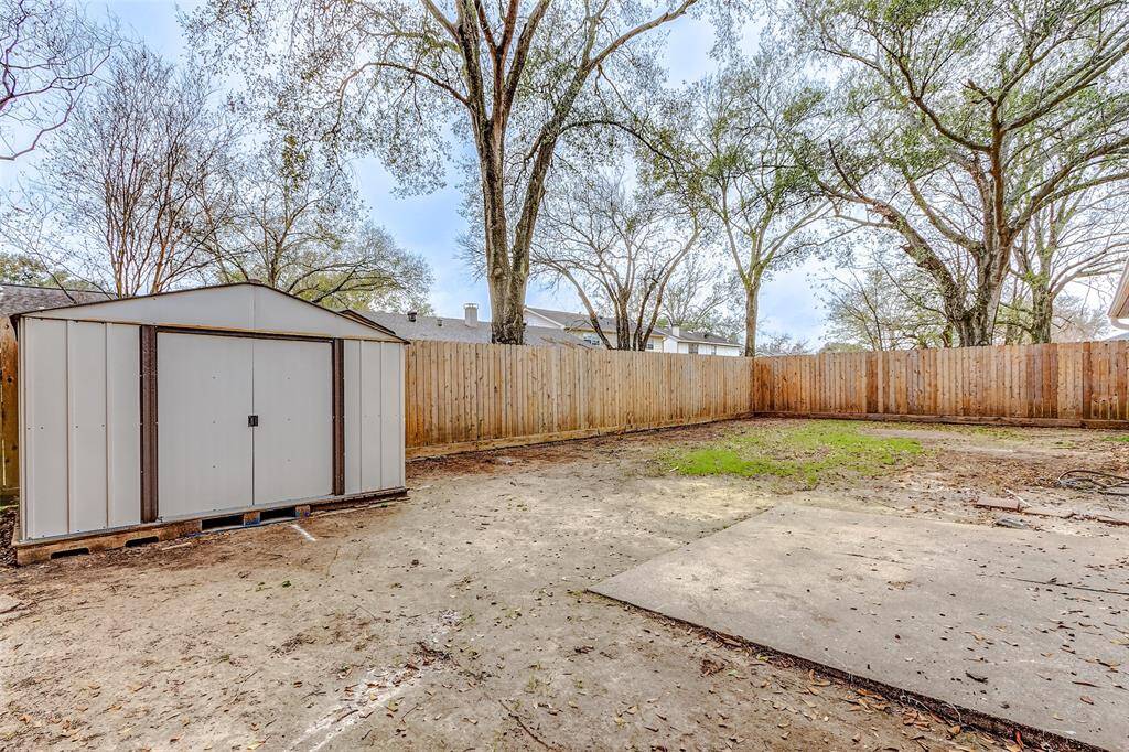 Spacious Backyard with Shed