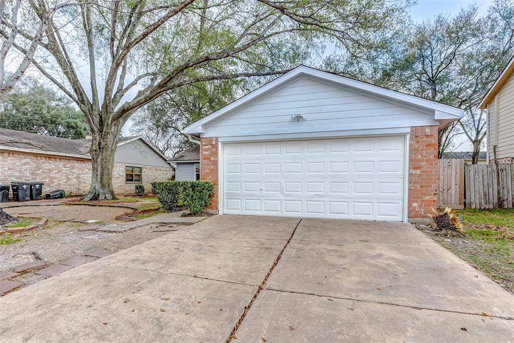 2-car garage with driveway for additional parking.