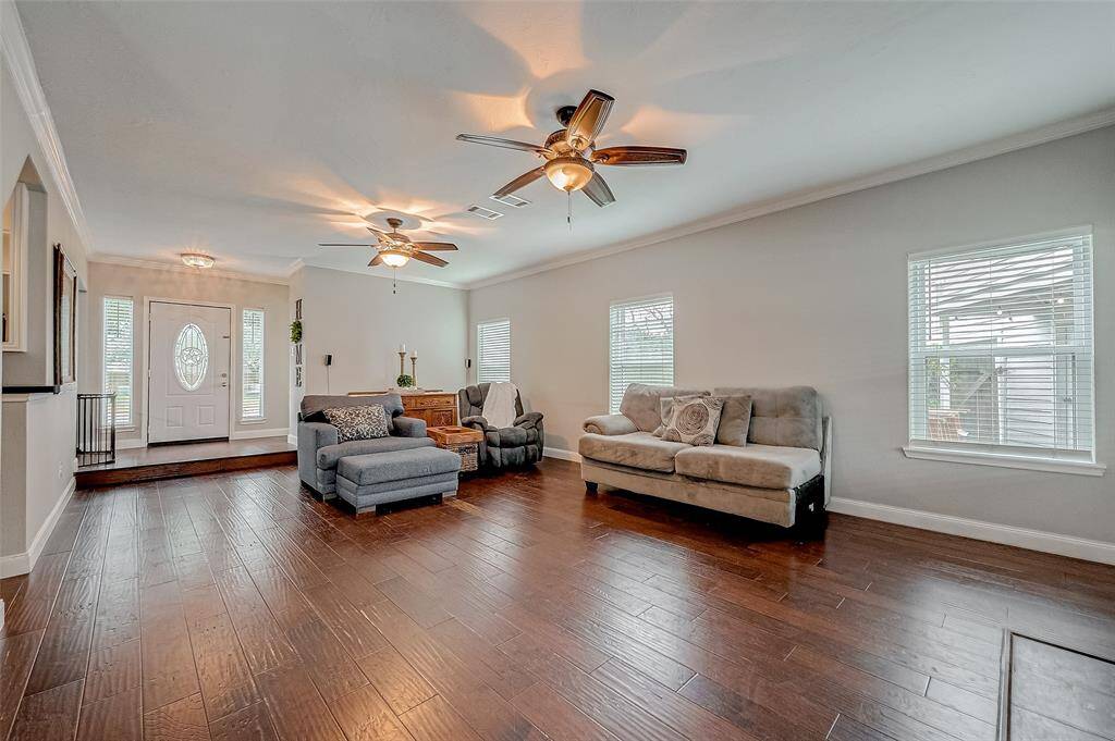The windows wonderfully illuminate this living room, keeping it light and bright.