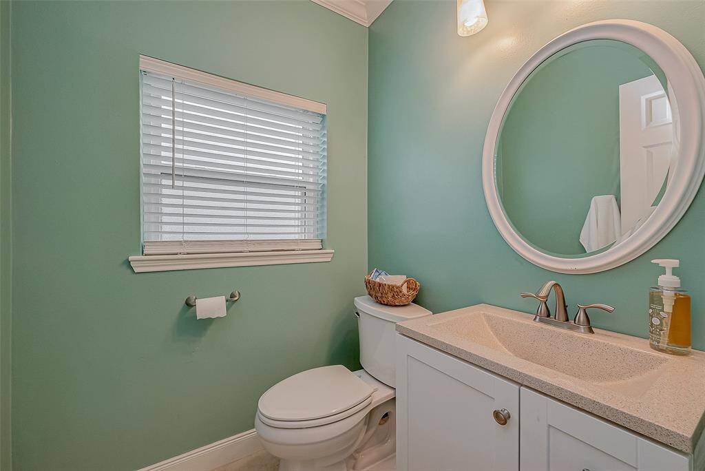 Half bath downstairs perfect for guests.
