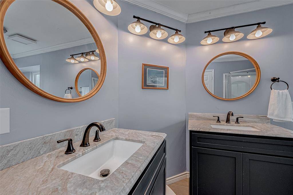 Separate vanities and sinks keep it simple for the daily grind.