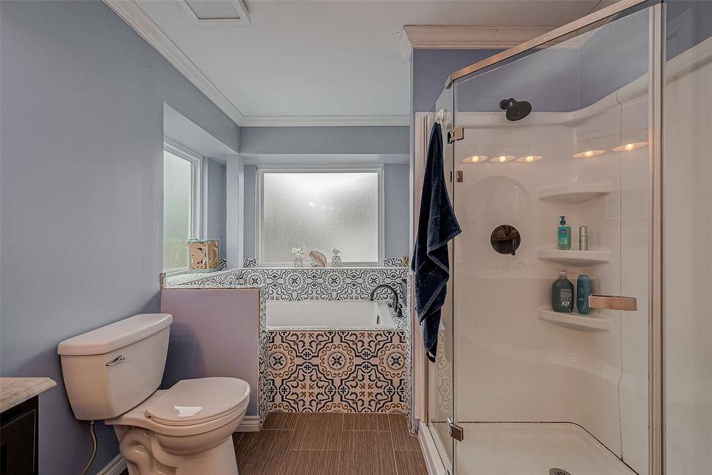 Soak your cares away in this large tub or keep it quick in your stand-alone shower.