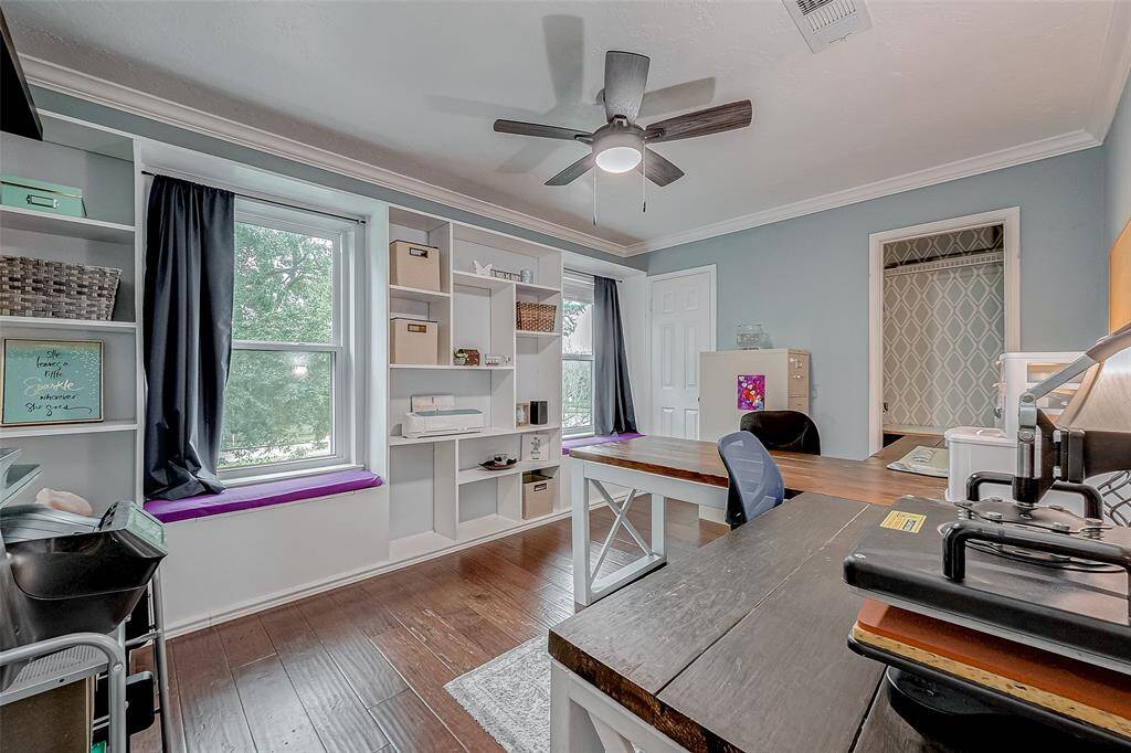Third bedroom, currently used as an office, has tons of space and shelving for your items and needs.