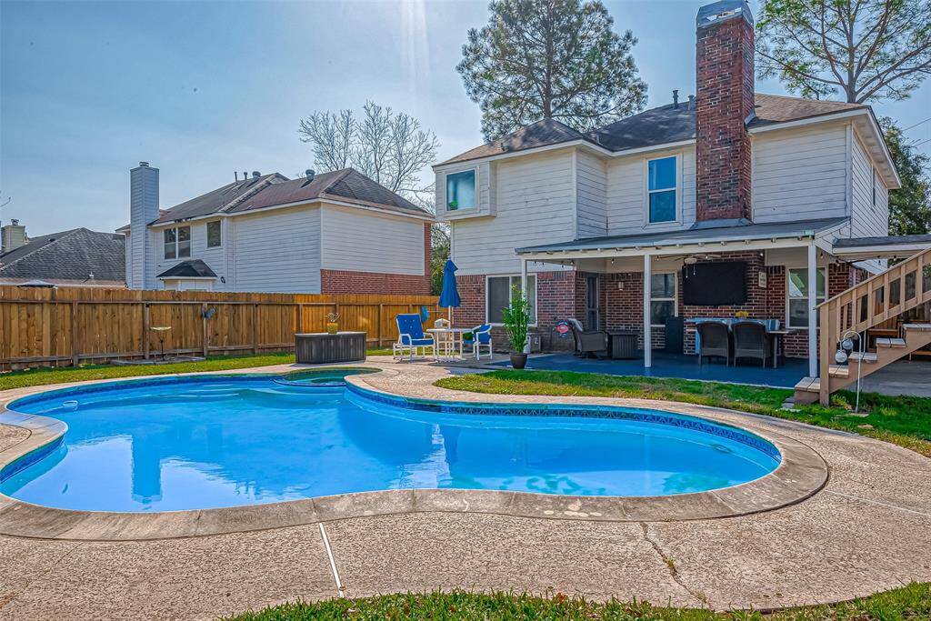 This pool will be welcomed by you when the heat starts rising here in Katy!