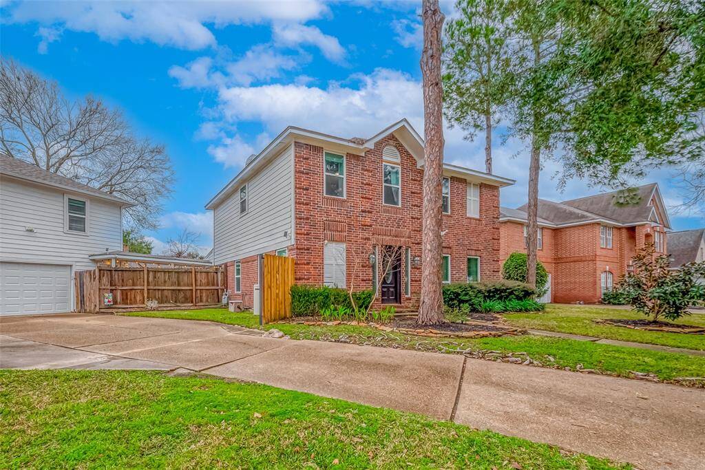 This home sits on an oversized lot and features a detached garage that includes a  500 sf apartment located directly above it.