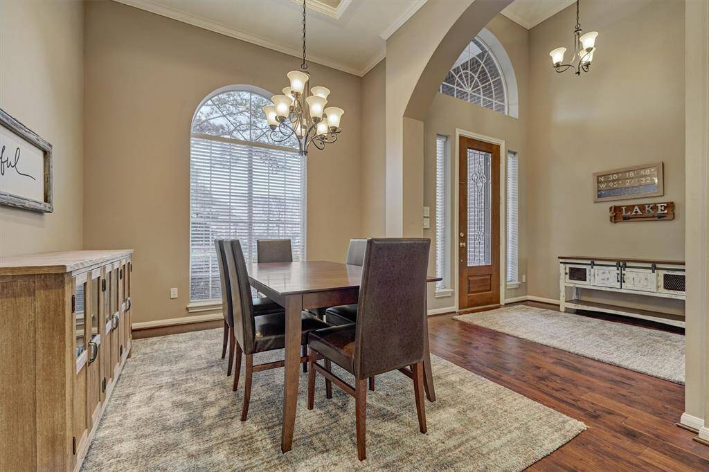 Oversized windows and high ceilings open up the space creating an open and airy ambiance.