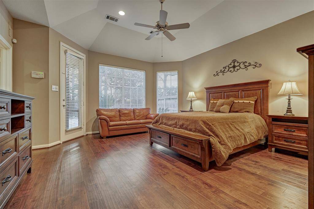 Convenient private access to the back yard patio and pool from the primary bedroom.