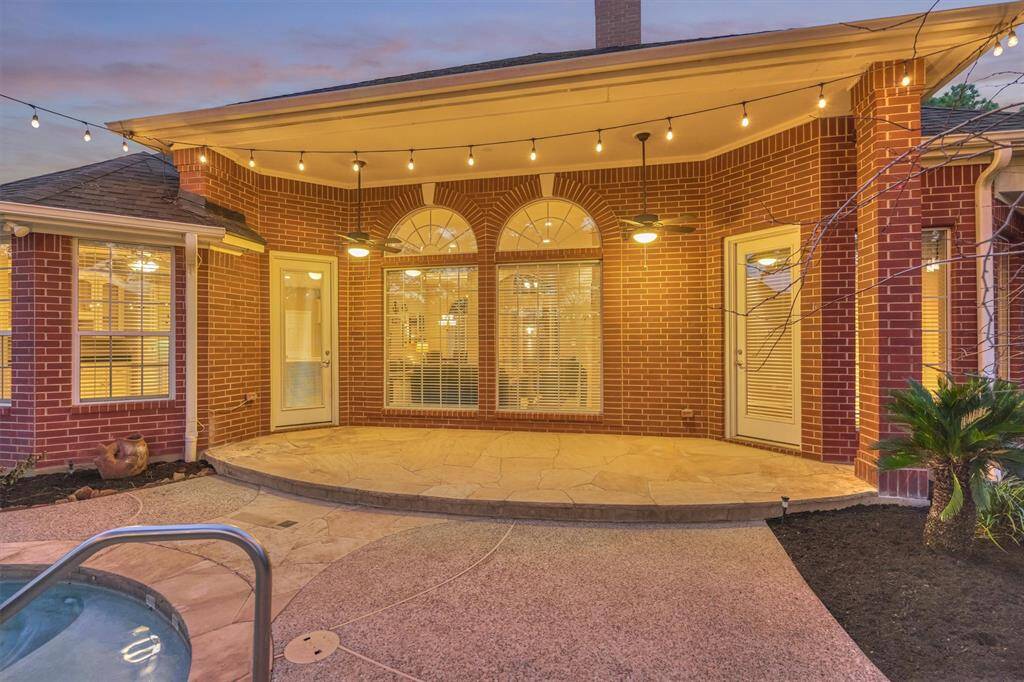 The covered patio is the perfect place to unwind and enjoy the evening breezes. There is plenty of room for an outdoor living room and/or dining area.