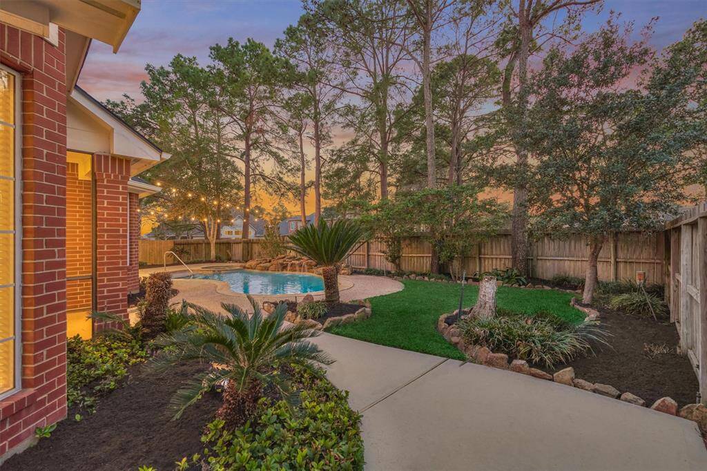 This enchanting backyard will provide hours of enjoyment on any given day.