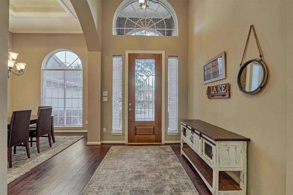 At look back at the foyer showing all of the natural light shining through.