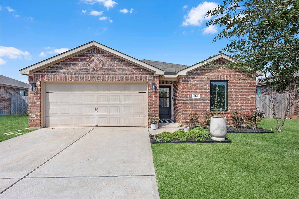Charming curb appeal with a welcoming entry.