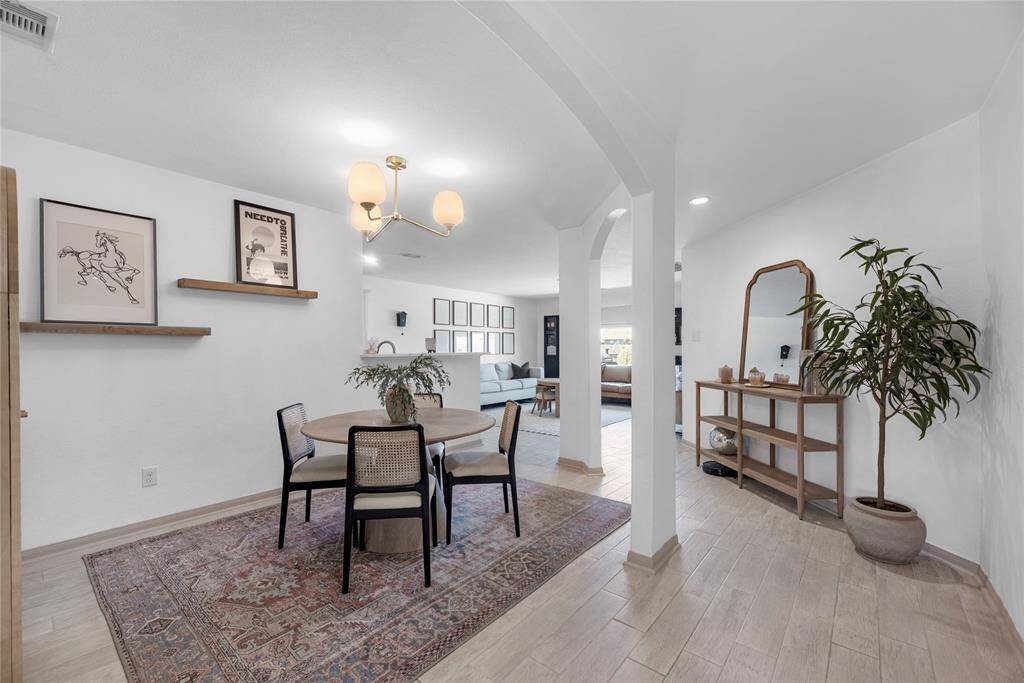 Updated flooring in the kitchen, dining, and living room.