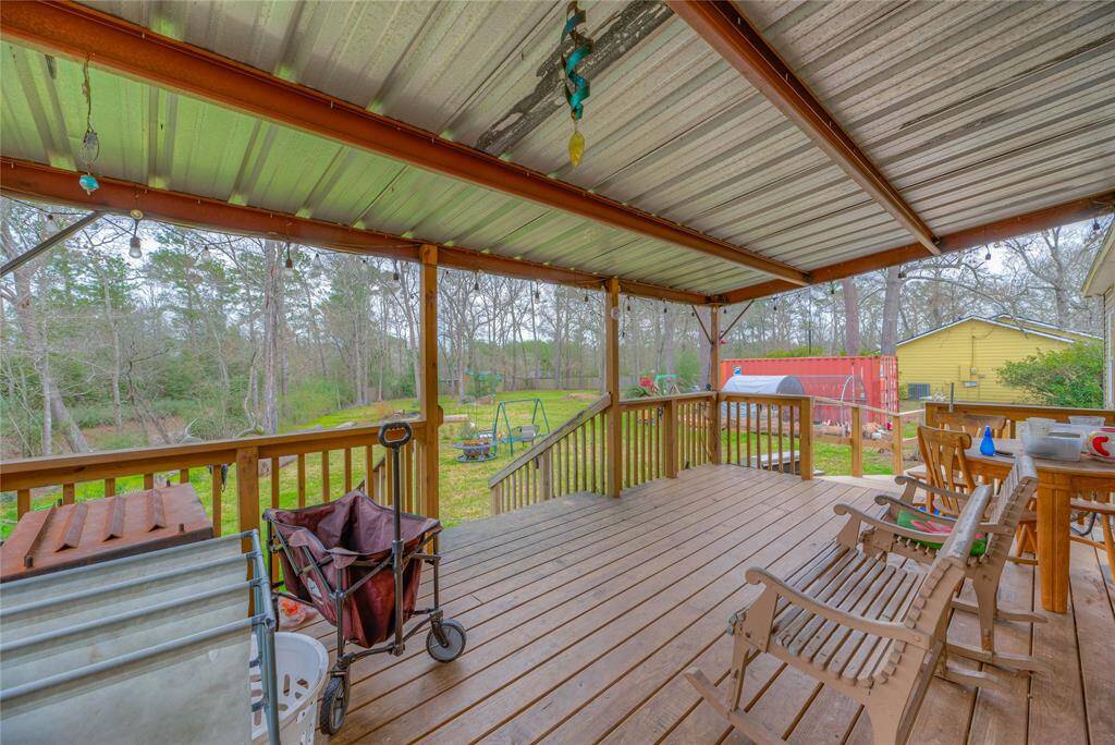 This home has a beautiful back cover porch that would be the perfect place to relax after a long day.