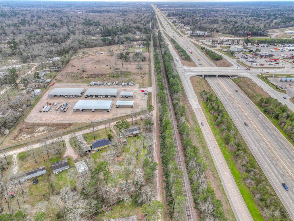 This photo shows the close-up view of the property.   Highway 59 on the right.