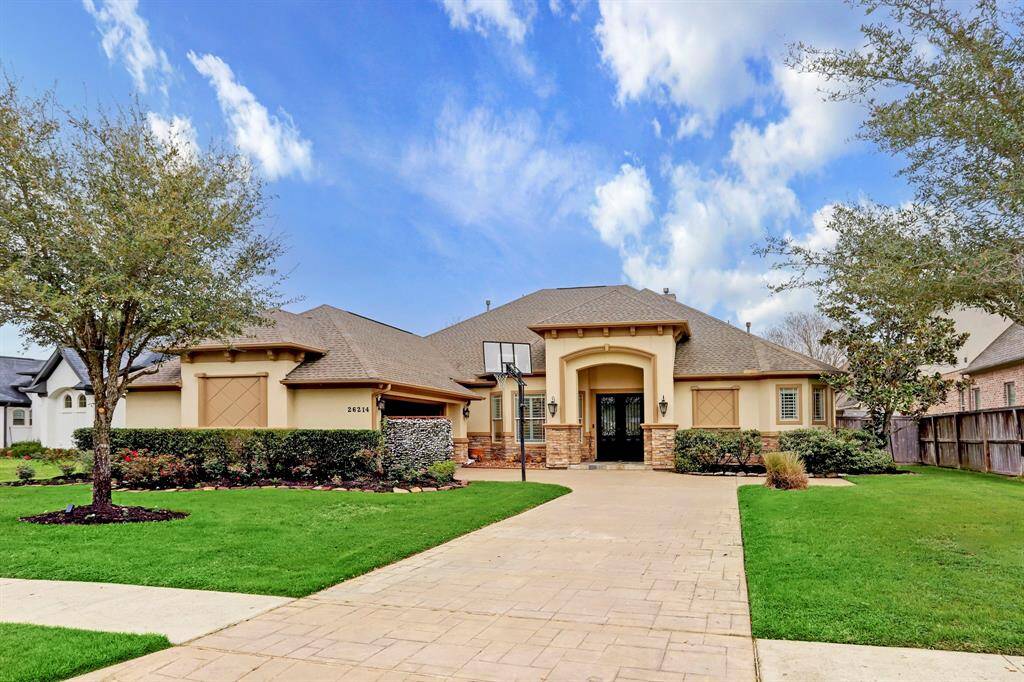 Nestled on a private street in the exclusive gated section of Woodcreek Reserve and zoned to the highly acclaimed Katy ISD, this stunning home offers both privacy and top-tier education opportunities. Boasting exceptional curb appeal, a meticulously maintained lawn, and lush landscaping, this residence makes a lasting first impression. From the moment you arrive, you’ll appreciate the attention to detail and inviting ambiance that make this home truly special.