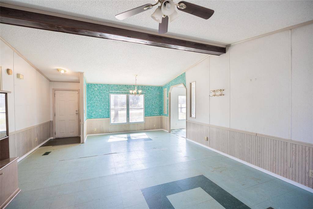 View of the front door from fireplace.