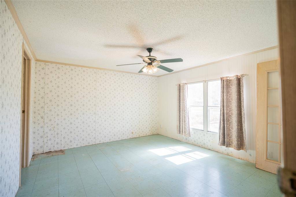 Primary Bedroom with large windows for natural light.