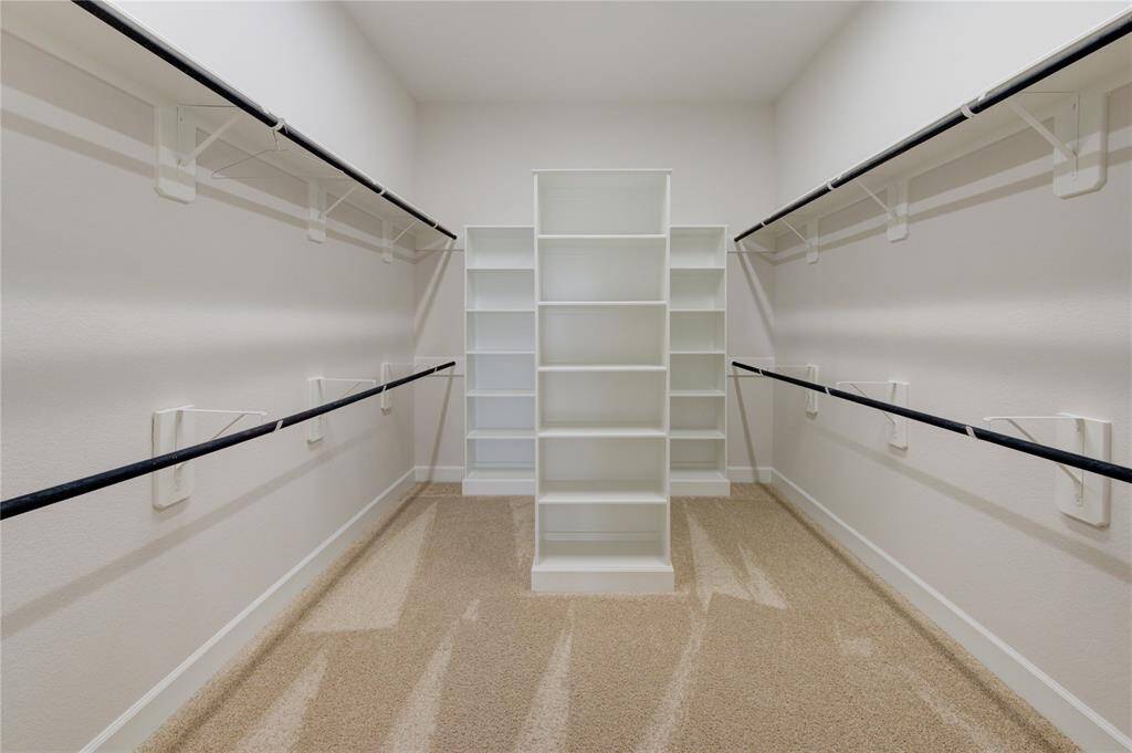 huge walk in closet in primary suite
