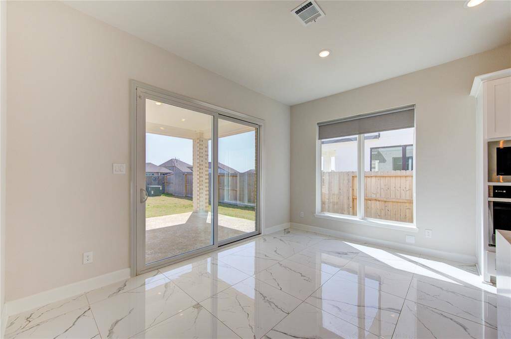 breakfast room and double French door to enjoy backyard