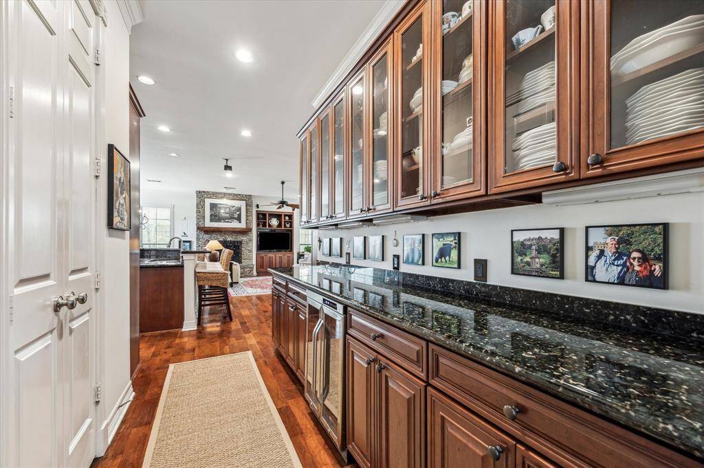 There is a butler's pantry leading from the dining room into the great room.