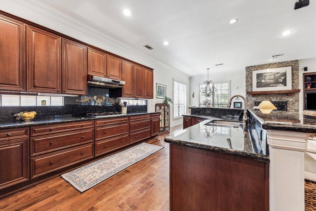 The lower cabinets have large soft close drawers and glass that emits more light.